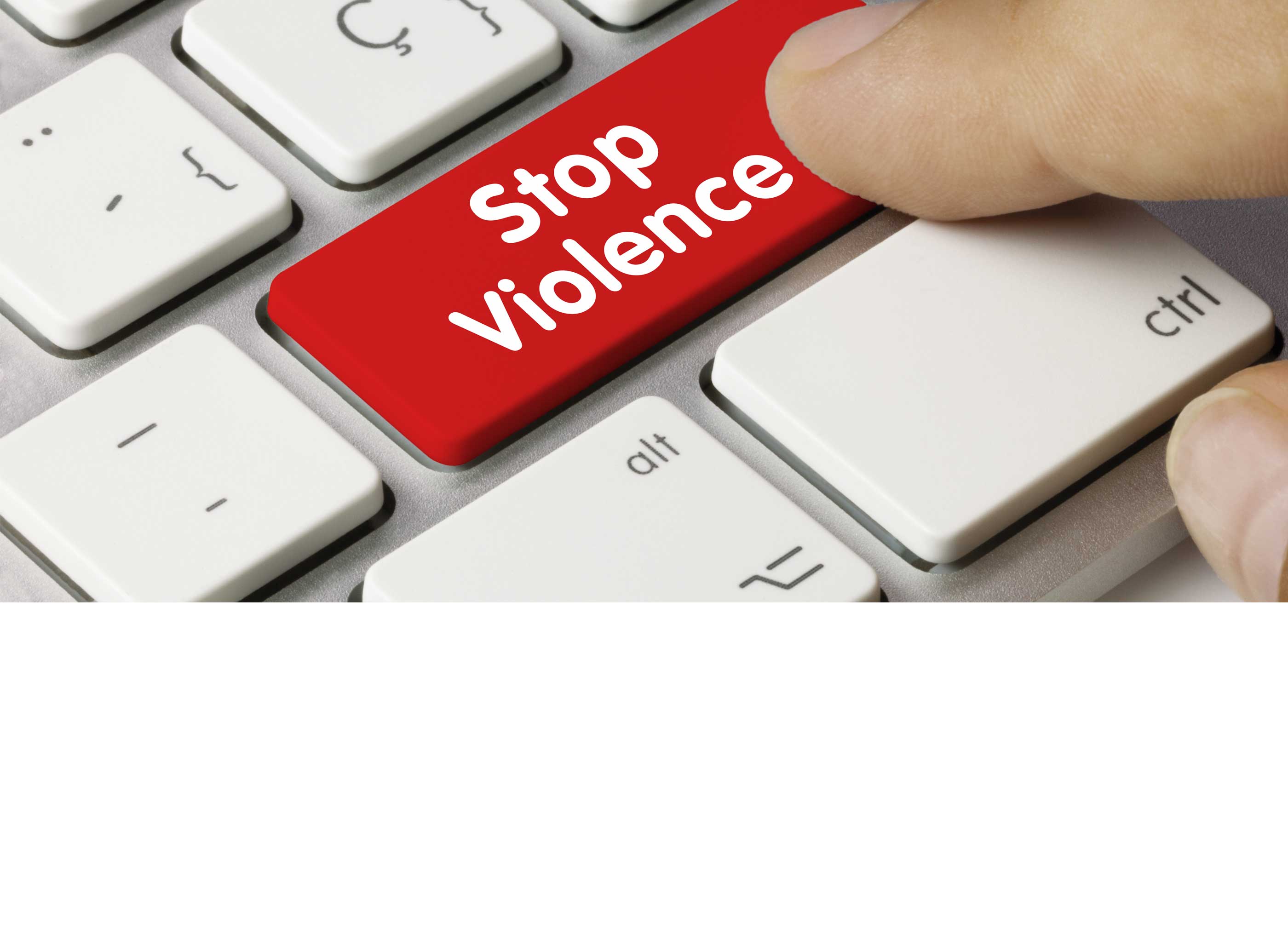 a bold red stop violence key on a keyboard